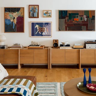 Torme 72" Media Unit - White Oak, styled in a bright room filled with colorful art and textiles