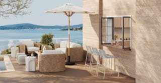 Sunny ocean facing patio, featuring the Ocean Inspired Gathering Space curated room, by Article's interior design team