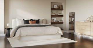 A bright airy japandi themed bedroom showing The Light Touch curated room design
