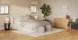 A bright airy japandi themed bedroom showing The Light Touch curated room design